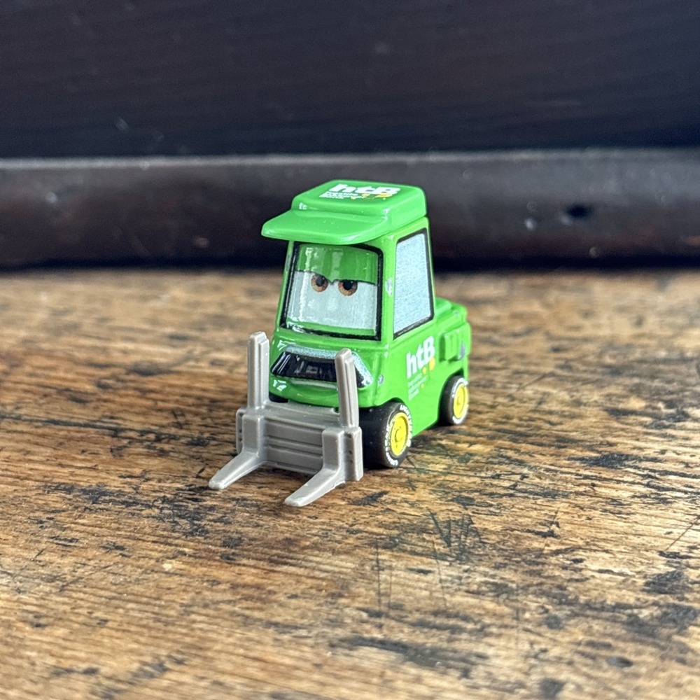 DISNEY PIXAR CARS GREEN DIECAST MINI HTB HOSTILE TAKEOVER BANK FORKLIFT CAR